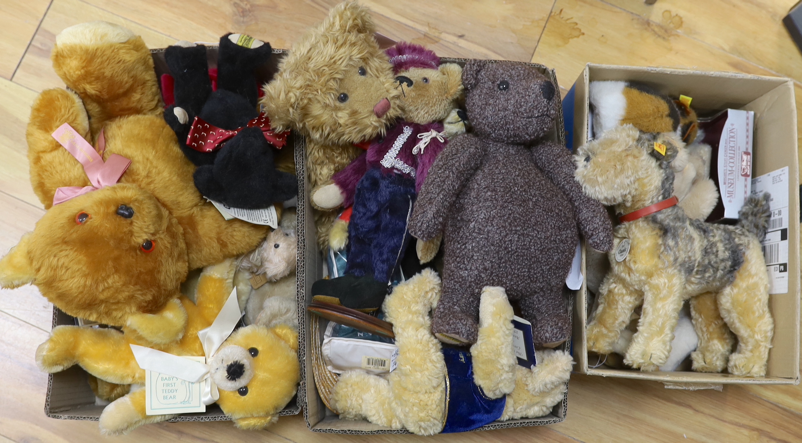 A Classic 'Fellow' Terrier label / tag with five assorted yellow tag animals, also boxed Museum Collection 'Rattler' Terrier white label with neck mechanism and a black Merrythought teddy